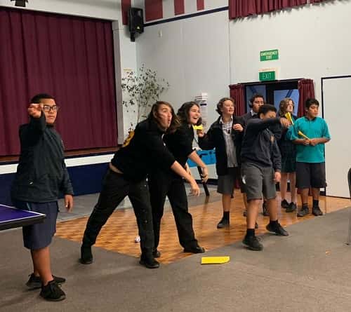 The Arvo’s team enjoying a friendly paper plane competition